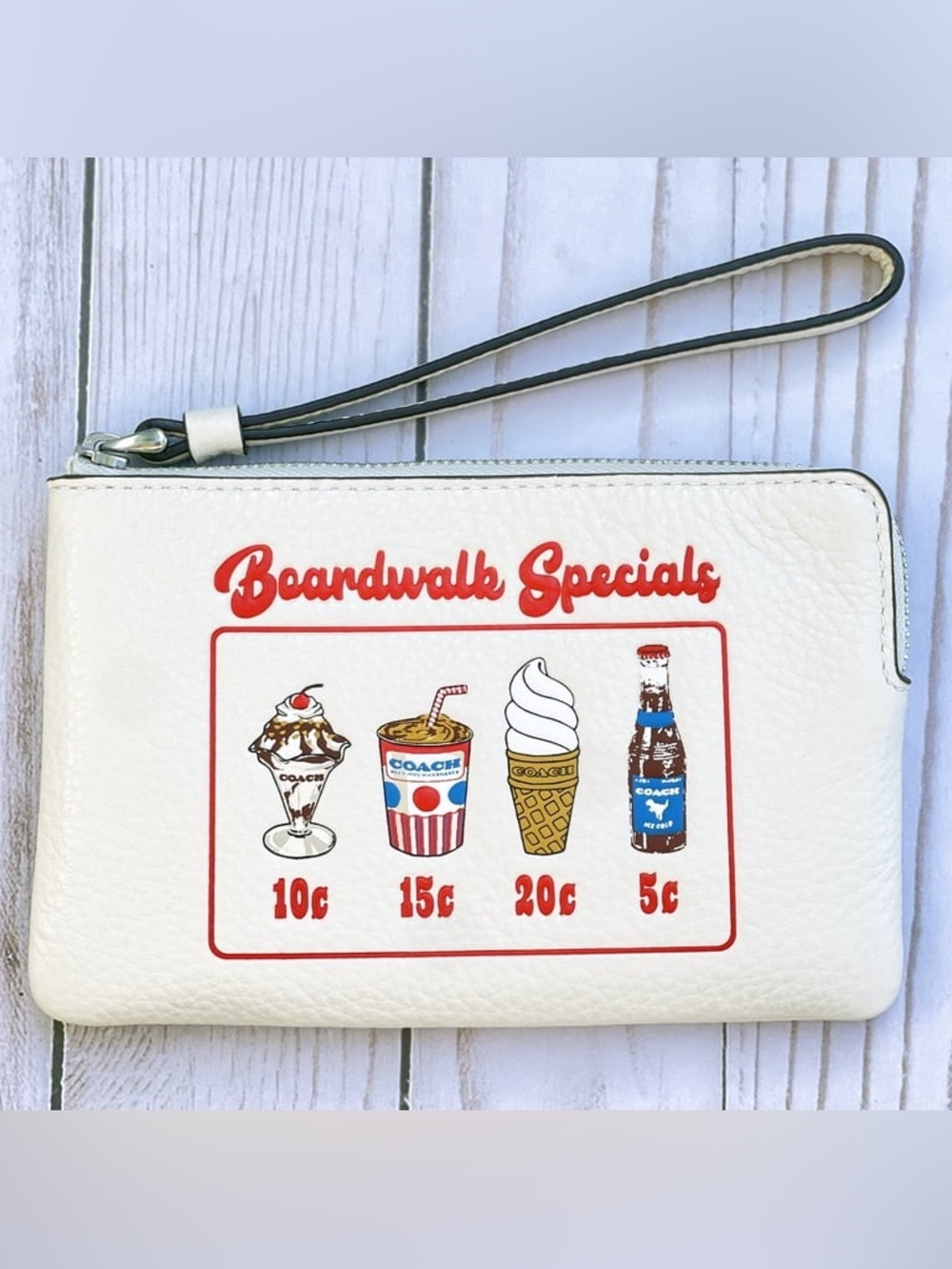 Coach White "Boardwalk Specials" Wristlet with Red and Blue Accents